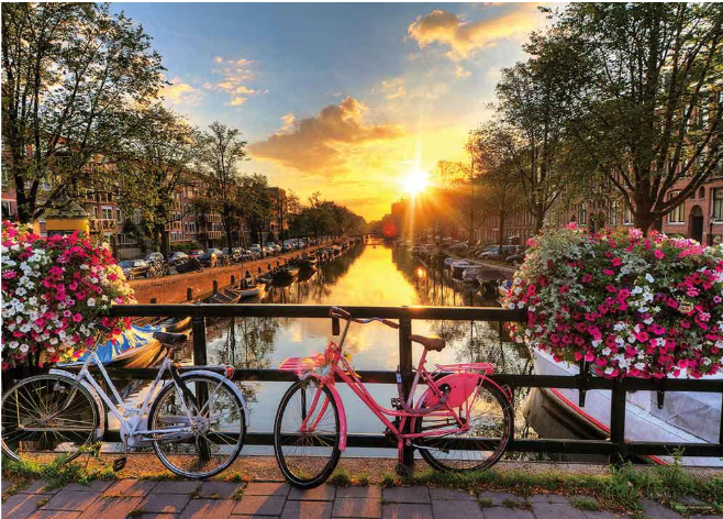 A Canal and the Cityscape Which the Light Shines